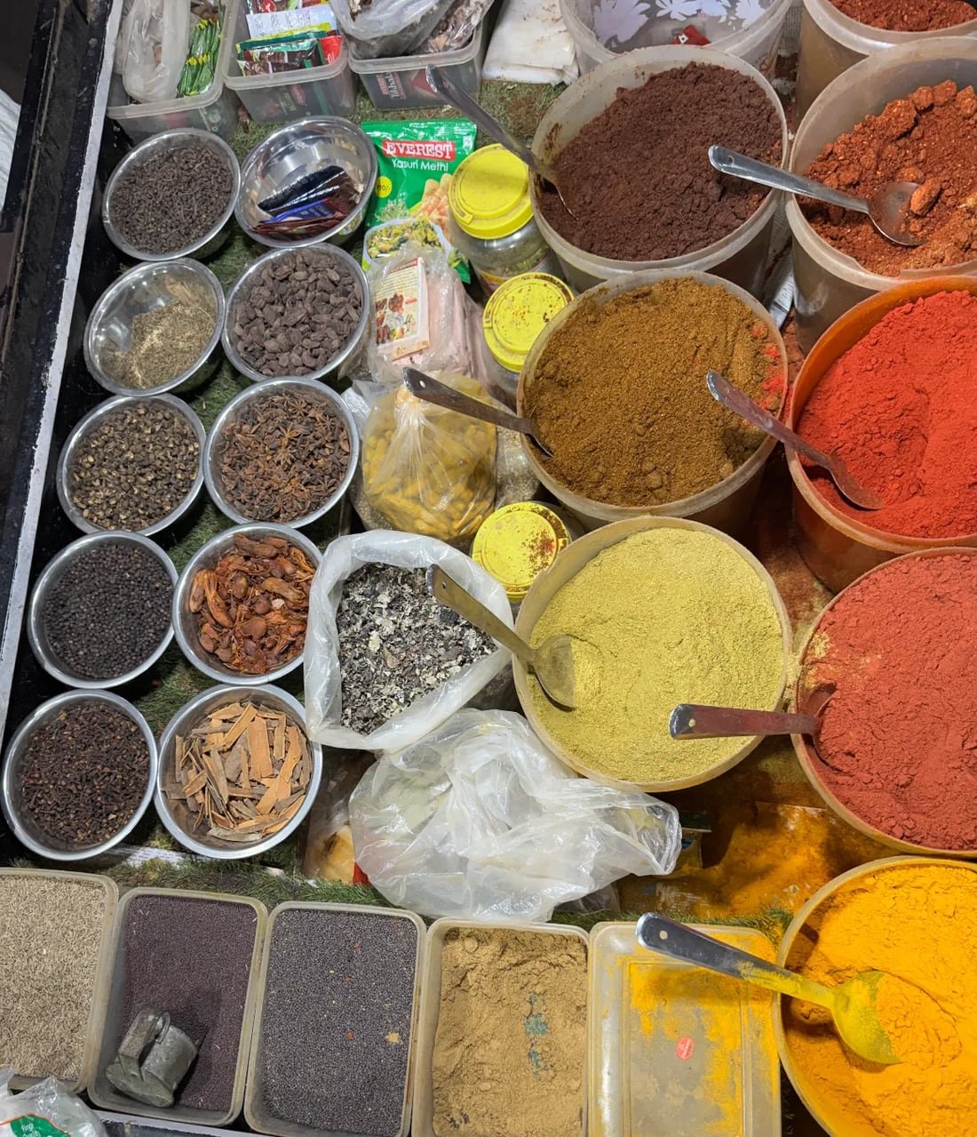 Hand-ground masale and whole spices.